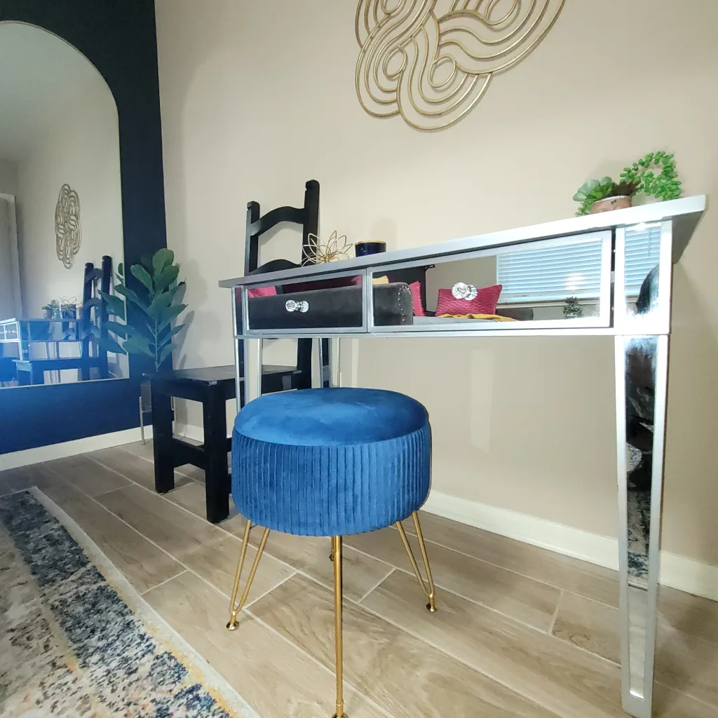 navy blue and gold velvet storage ottoman stool. Boho Glam Bliss: Budget Guest Bedroom Transformation For Under $1000 - Lani Does It