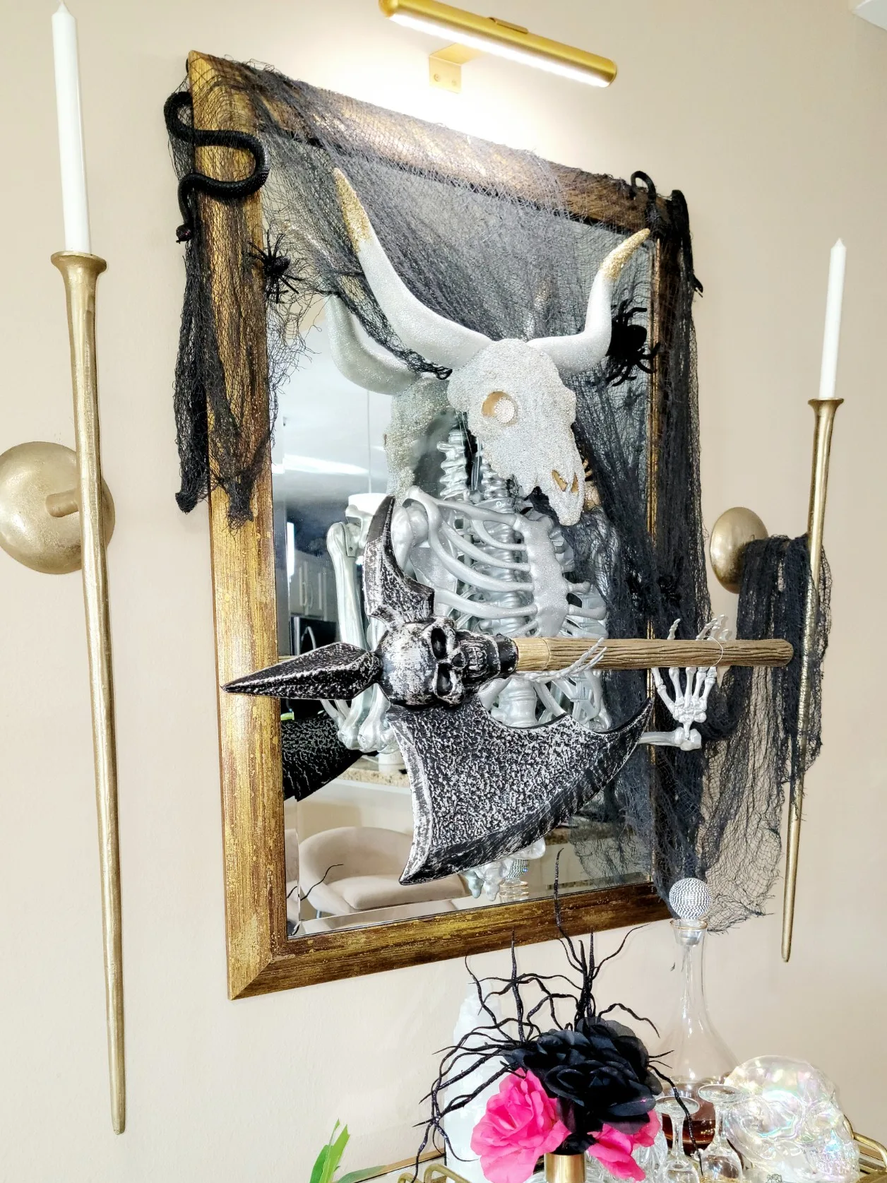 https://lanidoesit.com/how-to-diy-your-own-haunted-gold-skeleton-wall-mirror/ - DIY Skeleton Mirror - Haunter Minotaur Mirror