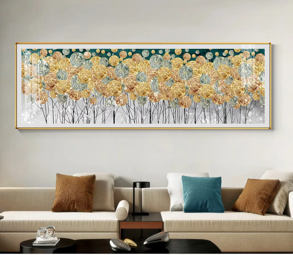 beautiful feminine oversized sofa length painting of yellow and grey flowers in a frame above a long beige sofa