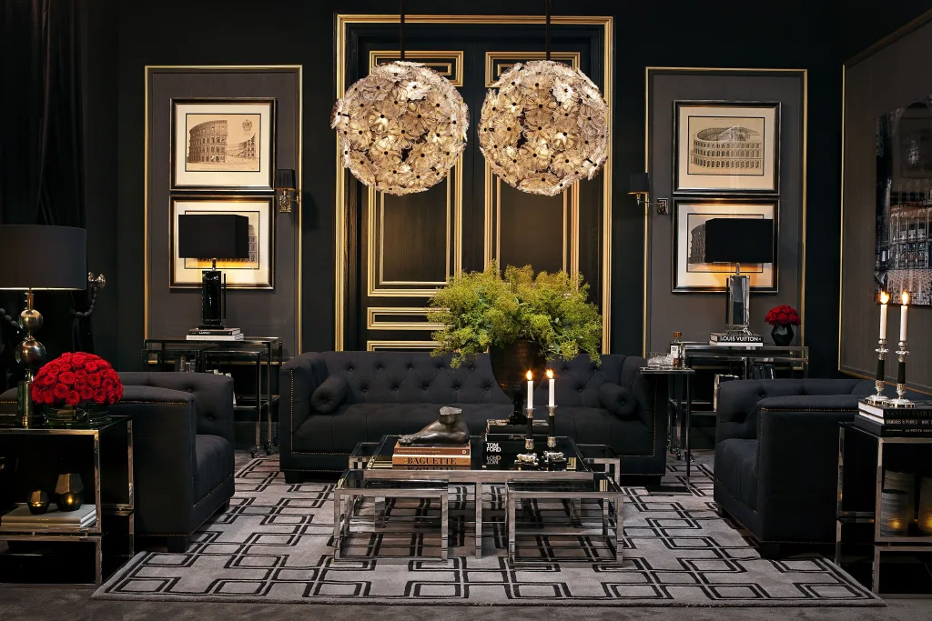 Elegant black living room with luxury hardware, florals, black furniture and walls, stunning double chandeliers
