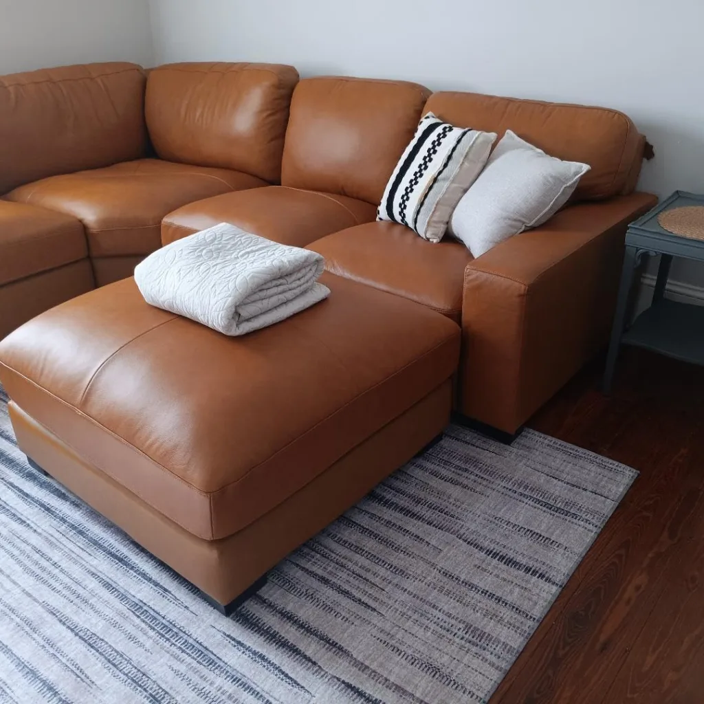 The Honest Truth About the 60-30-10 Rule in Interior Design - Boho Throw Pillow Ideas with Leather Sofa for Small Spaces