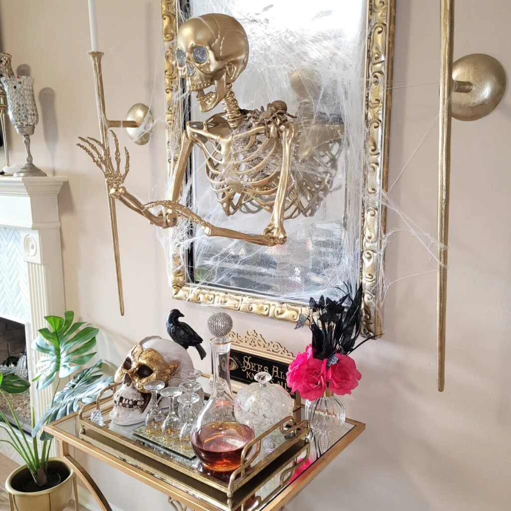 How To DIY Your Own Haunted Gold Skeleton Wall Mirror - Beautiful Ways to Use Skeletons in Your Halloween Decor
