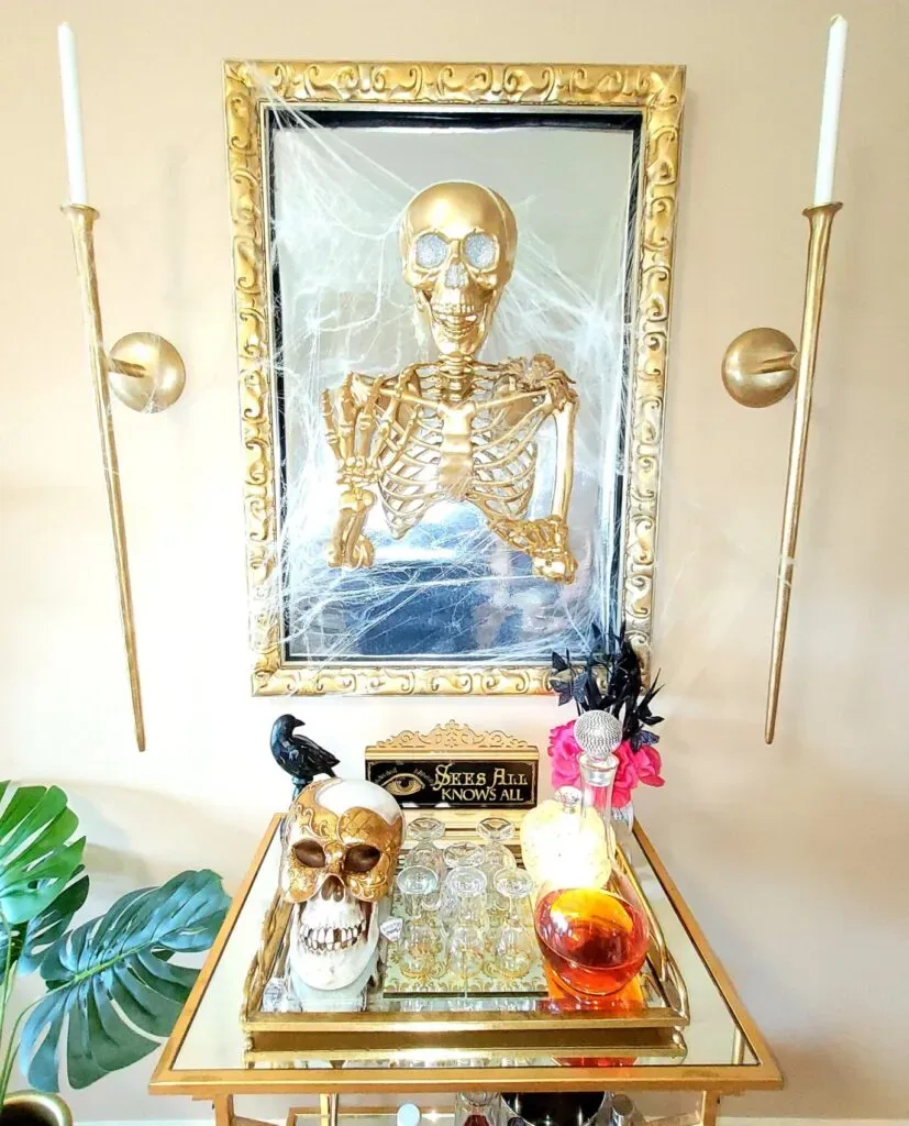 How To DIY Your Own Haunted Gold Skeleton Wall Mirror - Beautiful Ways to Use Skeletons in Your Halloween Decor