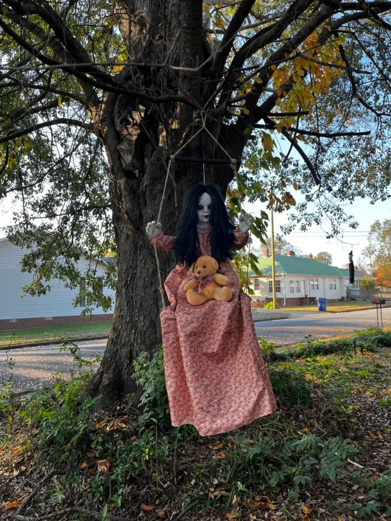 Amazon - Outdoor Halloween Doll Decorating Inspiration For A Creepy Display - Halloween Doll Decor Ideas That Are Creepy in the Best Way
