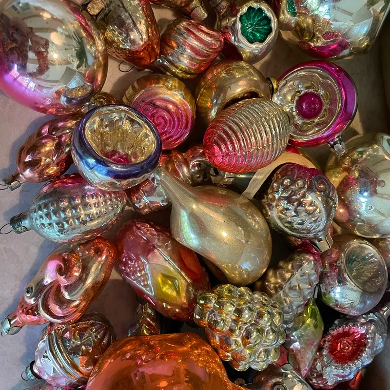 Beautiful Designer Christmas Decor Dupes You Can Buy or DIY – Colorful Vintage Glass Ornaments

A collection of colorful glass Christmas ornaments features rich shades of red, gold, turquoise, pink, and amber. With their glossy finishes, ribbed textures, and vintage-inspired shapes, these baubles add a playful yet luxurious look to holiday decorating.