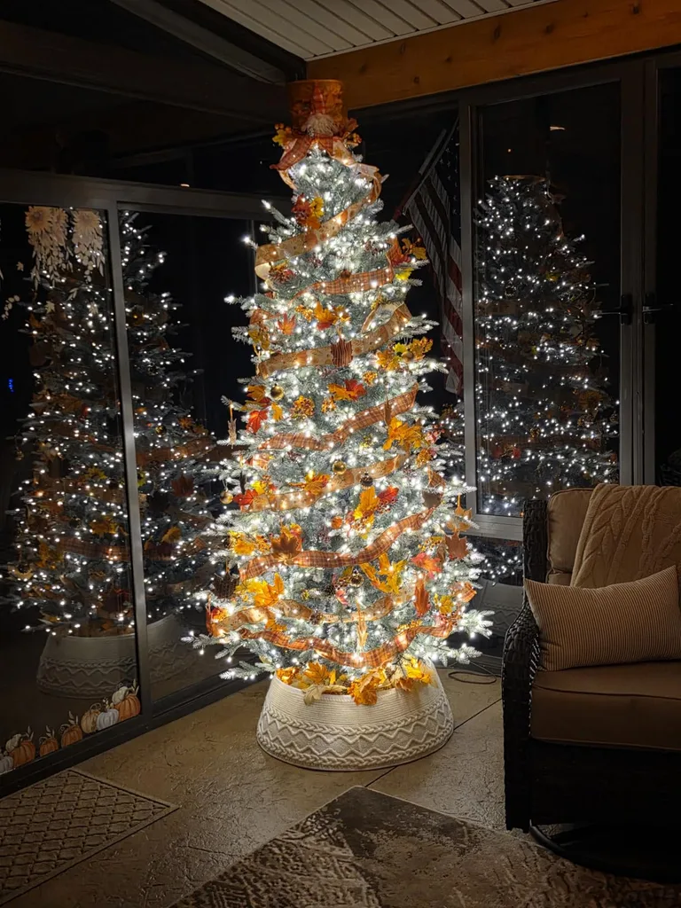 Beautiful Designer Christmas Decor Dupes You Can Buy or DIY – Elegant Lighted Christmas Tree

A slender Christmas tree glows with warm white lights and sparkling ornaments in a softly lit living room. Its illuminated branches create a festive focal point, offering inspiration for a cozy and elegant holiday display.